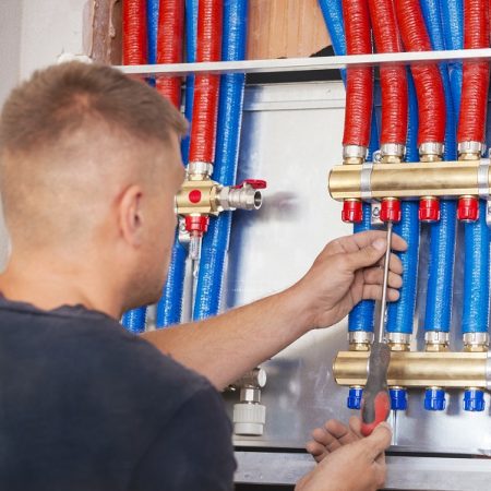 Plumber mounted distributor of central heating. Central Heating Distributor